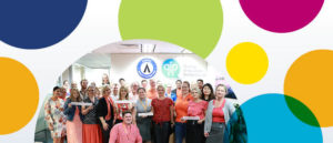 Header image with colourful circle background, with a featured semi-circle image with the AGPAL team on Patient Safety Day 2019
