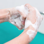 Nurse perform surgical hand washing, Preparation to the operating room. Closed-up of the hands.